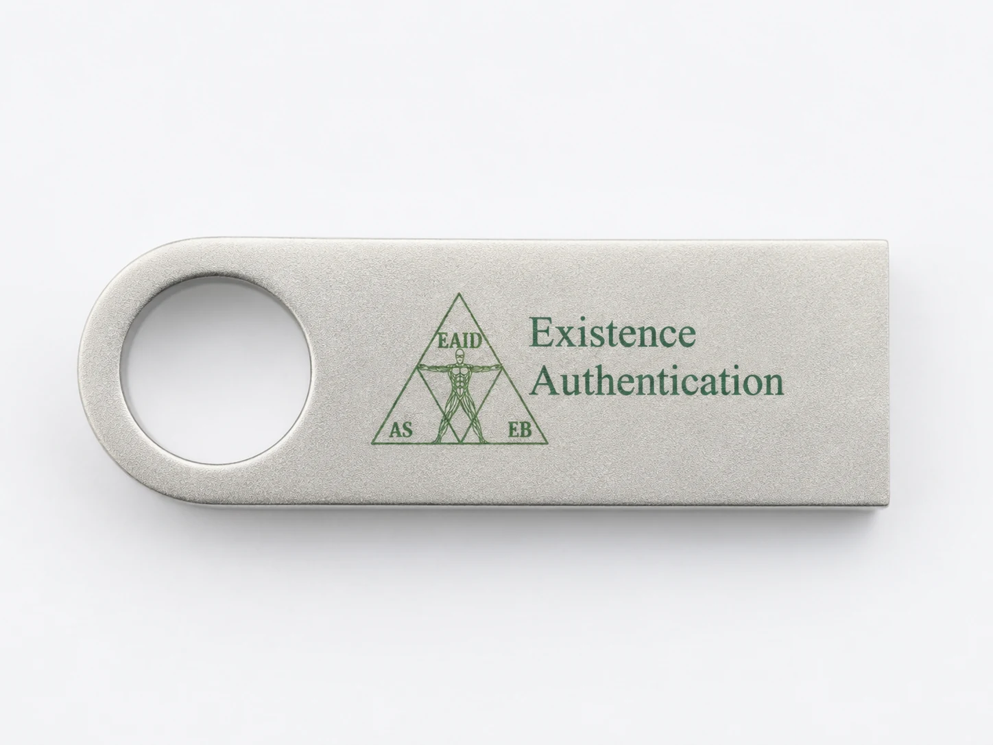 Experience EAID USB in brushed silver metal, shown horizontally on a clean white background with the Existence Authentication mark engraved on its surface.